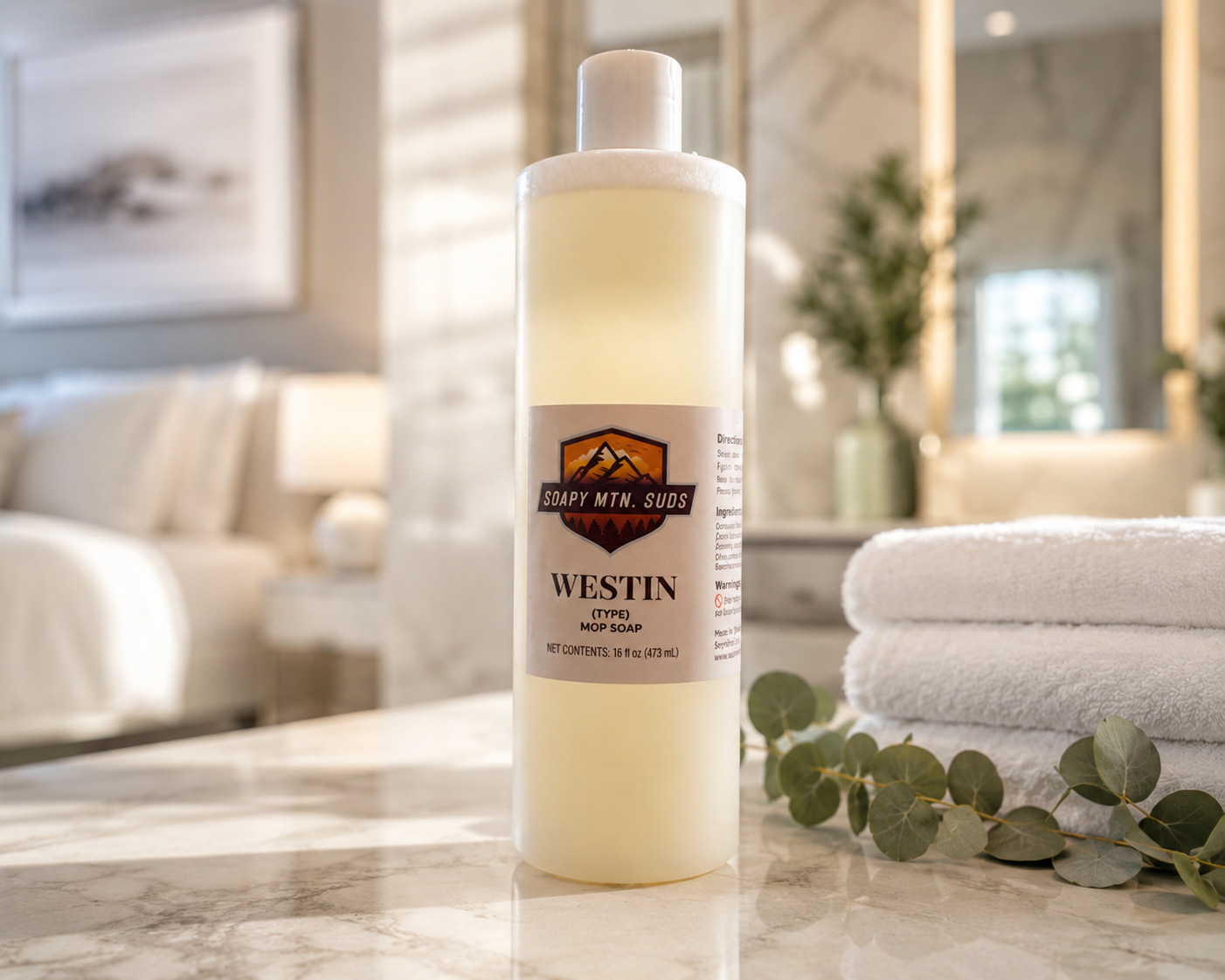 Westin Type Mop Soap by Soapy Mtn Suds displayed in a luxury hotel-inspired suite with marble countertop, fluffy white towels, spa decor, soft natural lighting, and upscale clean-home aesthetic. Premium luxury floor cleaner and mop soap product photography with fresh resort-style vibes.
