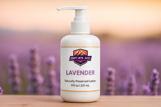 Lavender Naturally Preserved Lotion by Soapy Mtn Suds with lavender fields background, 8oz bottle of moisturizing natural lotion made with gentle lavender essential oil core collection item