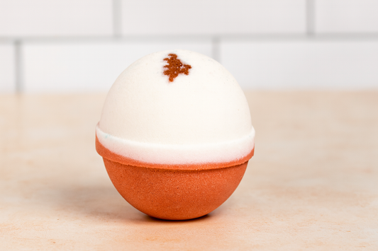 Oat Milk Honey Shea Butter Bath Bomb by Soapy Mtn Suds with creamy white and golden tones, nourishing moisturizing bath bomb made with shea butter and soothing oatmeal scent